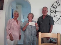 Cheque presentation to 'Shelters' Committee