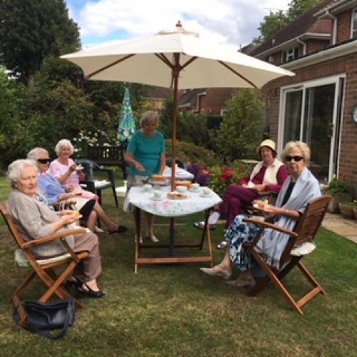 Small group tea party in a members garden