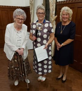 Pauline Burleigh inducted as a member by Margaret and Carla