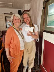 President Barbara presenting a cheque to Mama to Mama President Barbara presenting a cheque to Mama to Mama